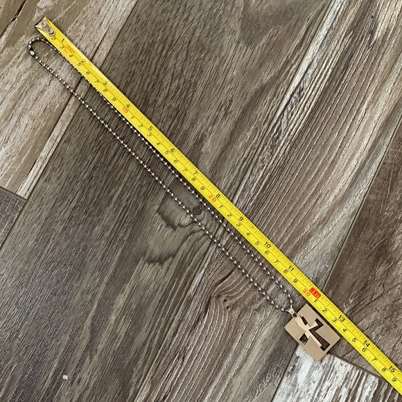 $5 add-on to any Bundle!!  
Metal cross cut-out pennant and chain - Picture 6 of 7